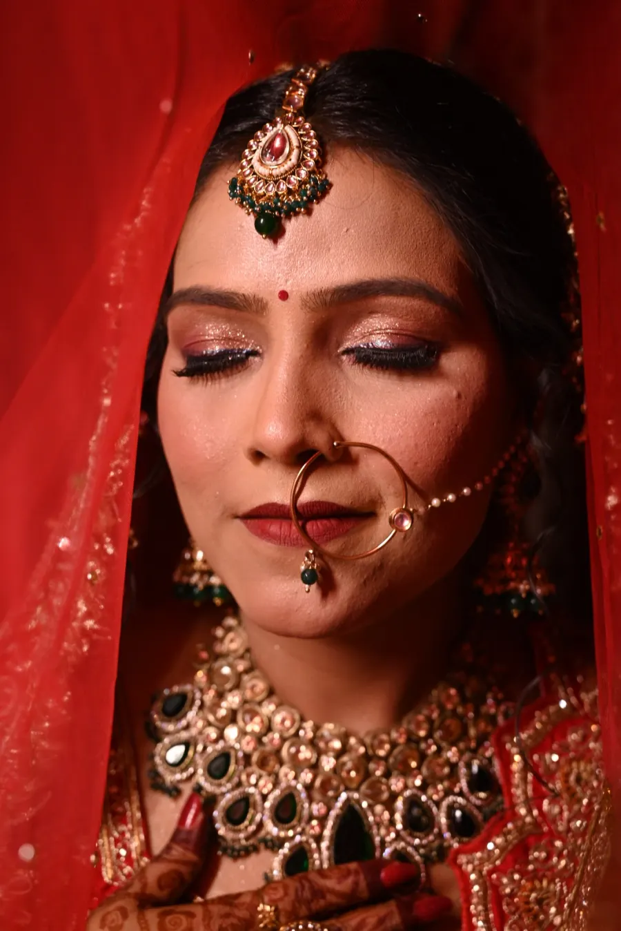 Bridal close-up with maang tikka and nath