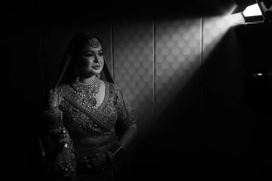 Black-and-white bridal portrait with directional window light