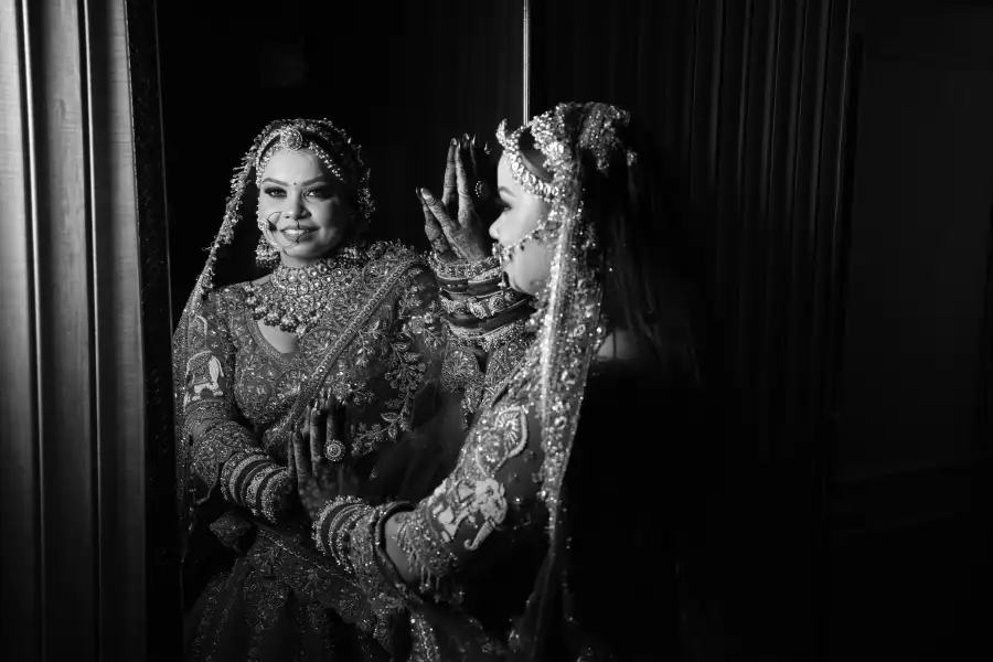 Bride admiring her reflection in the mirror